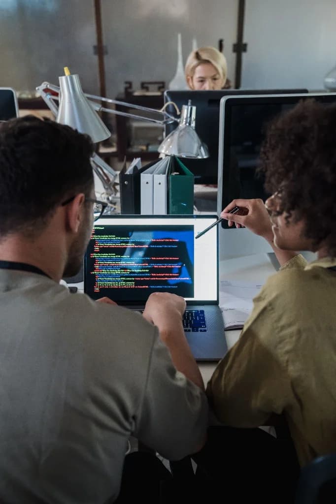 Developers collaborating on agile software build and code review