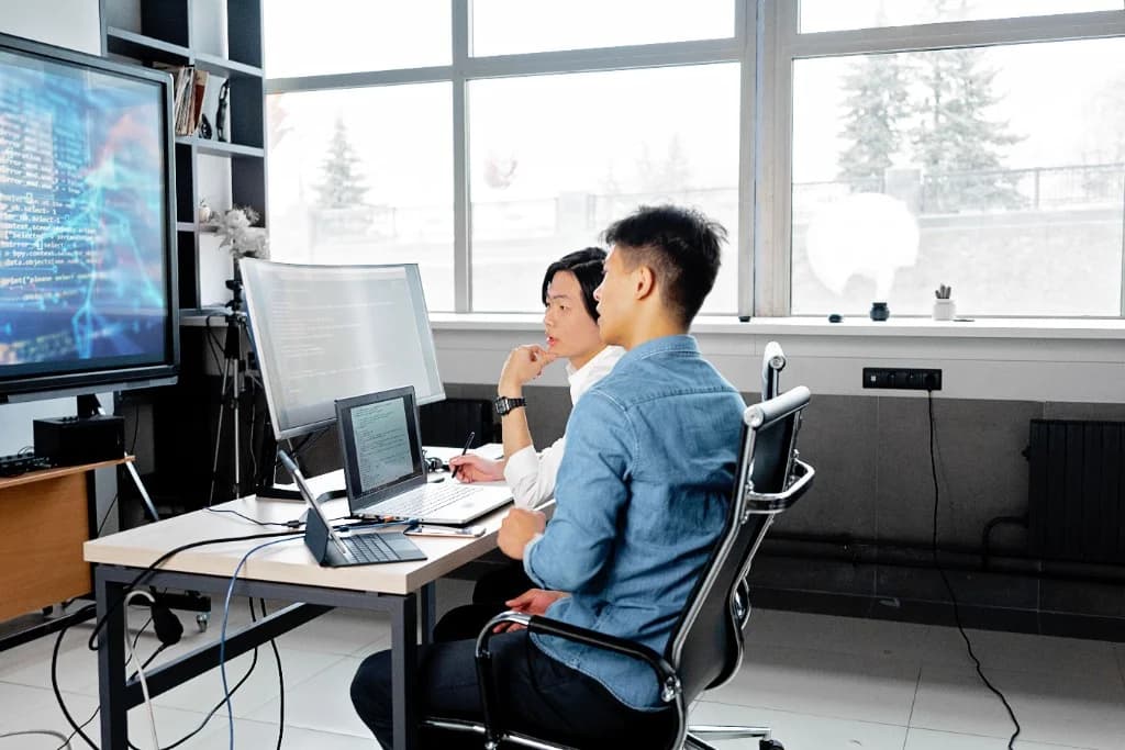 Developers collaborating on an AI product build